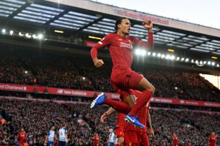 Virgil van Dijk was the unlikely goalscoring hero when Liverpool scraped past Brighton at Anfield. The Holland defender headed two first-half goals before the hosts were forced to hang on for a 2-1 victory following the dismissal of goalkeeper Alisson Becker