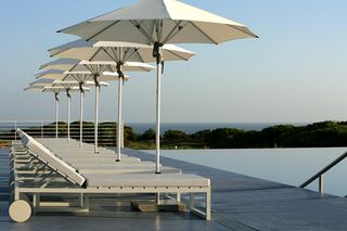 lounge chairs with umbrella