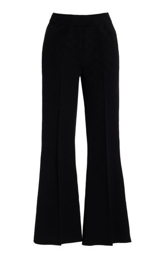 Kick Flared Stretch-Cotton Knit Pants in Black
