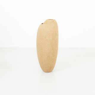 Oval stone coloured sculpture