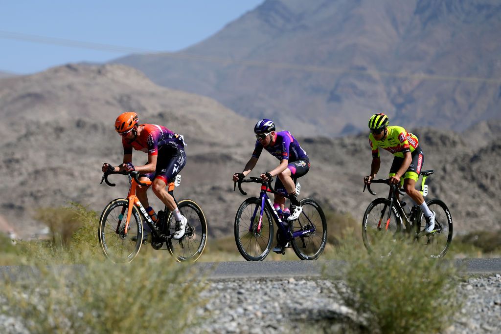 JABAL HATT OMAN FEBRUARY 13 LR Stephen Bassett of The United States and Team Human Powered Health Alejandro Franco Gonzalez of Spain and Team BurgosBH and Johan Meens of Belgium and Team Bingoal WB compete in the breakaway during the 12th Tour of Oman 2023 Stage 3 a 1518km stage from Al Khobar to Jabal Hatt 1000m TourofOman on February 13 2023 in Jabal Hatt Oman Photo by Alex BroadwayGetty Images