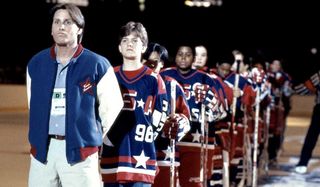 D2: The Mighty Ducks Emilio Estevez stands in line with his young Olympic team