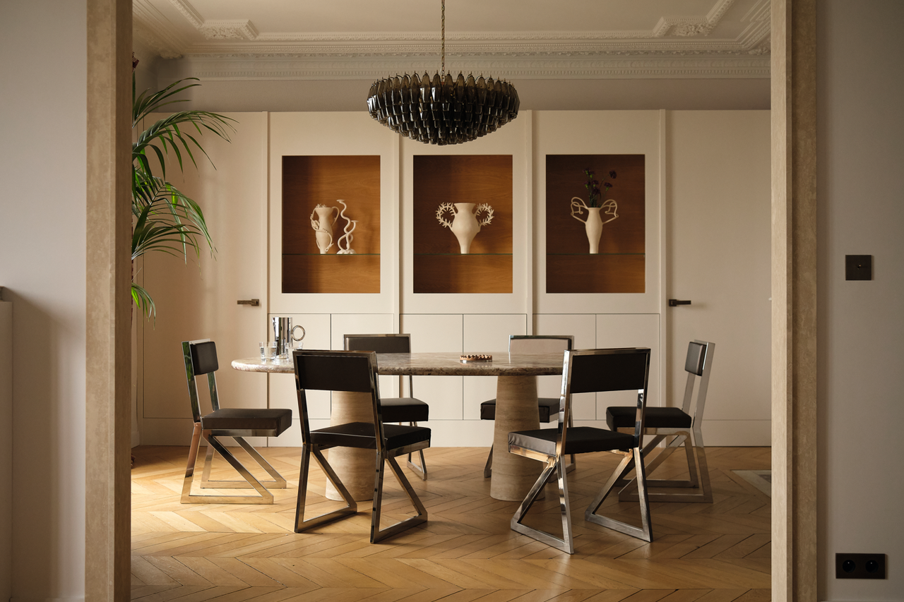 A dining room with ceramics in the wall