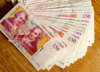 close up of old £50 notes showing Matthew Boulton and James Watt