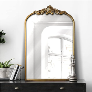 Ornate mantle mirror.