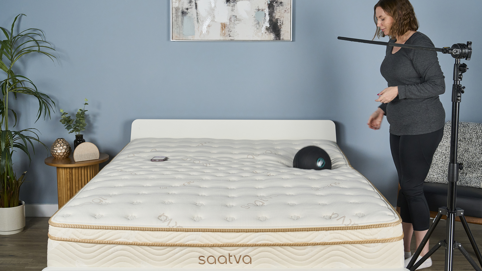 5kg slam ball hits the top of the Saatva Classic mattress during our lab-based motion isolation test