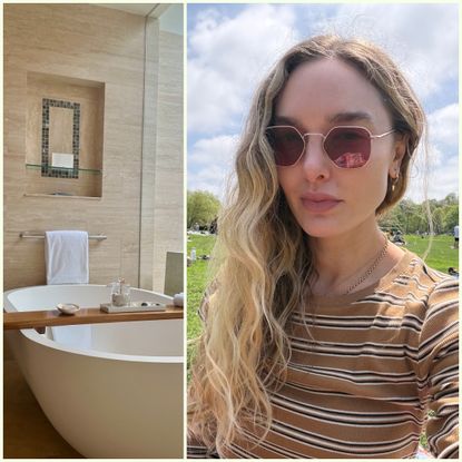 a woman with blonde wavy hair sitting on grass next to a minimalist white tub with a bath board and products