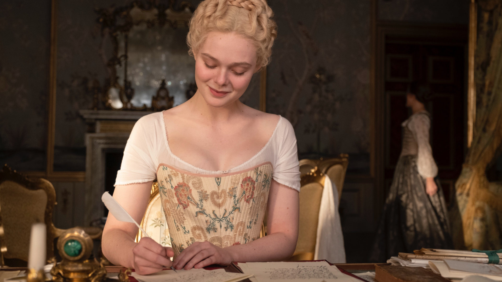 Ell Fanning's Catherine the Great writes a letter in The Gear TV show