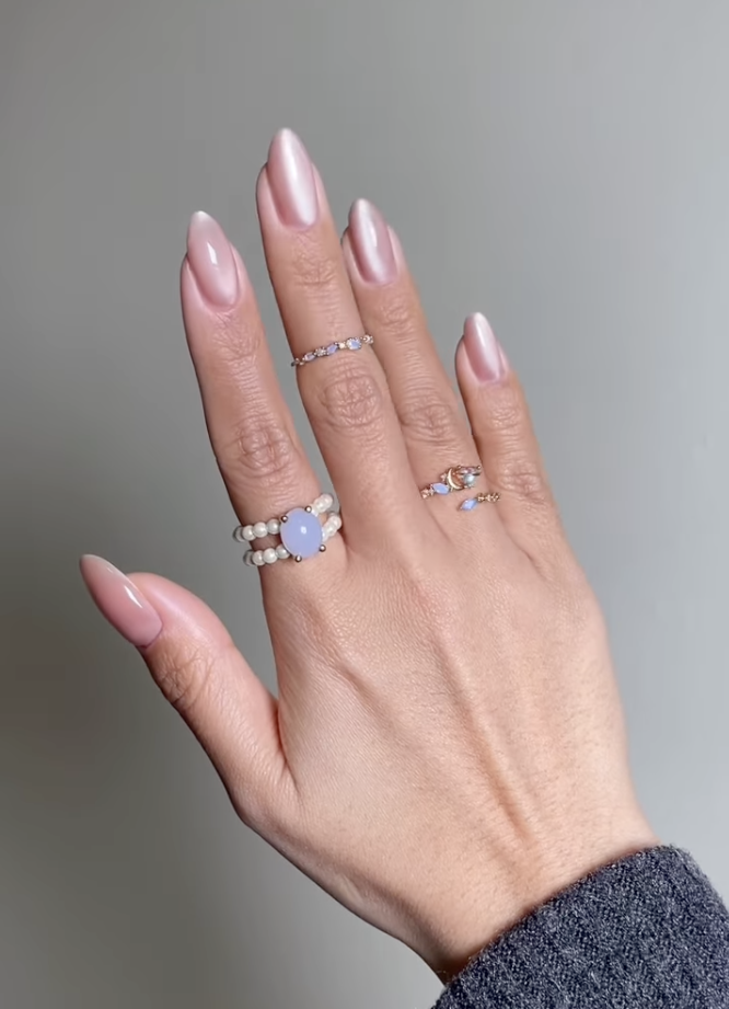 Nude pink velvet nails.