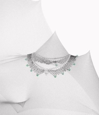 Multi level diamond necklace with green opals.
