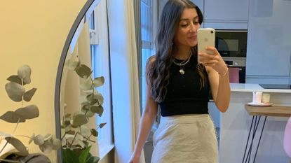 Fashion Editor Zoe Anastasiou wears Midi skirt and top outfit formula