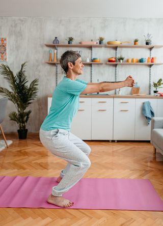 woman doing Aerobics at home