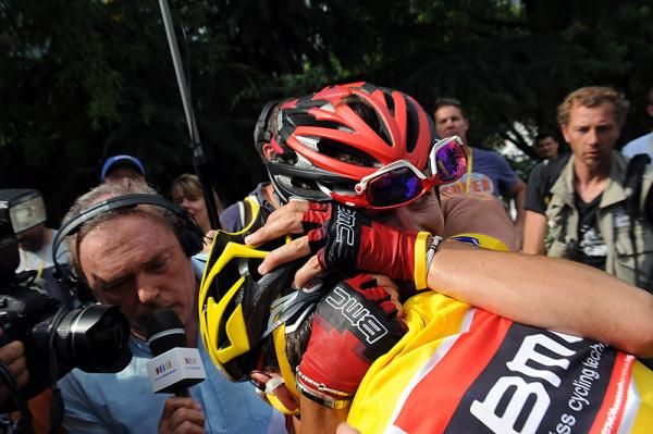 BMC Racing teammates Cadel Evans and Mauro Santambrogio embrace after stage 9.