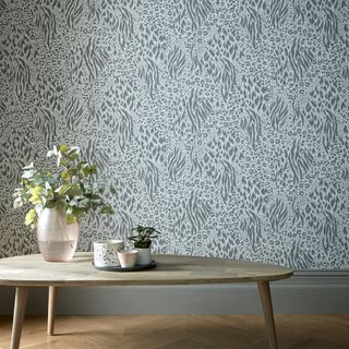 savannah wallpaper with plant on vase and table
