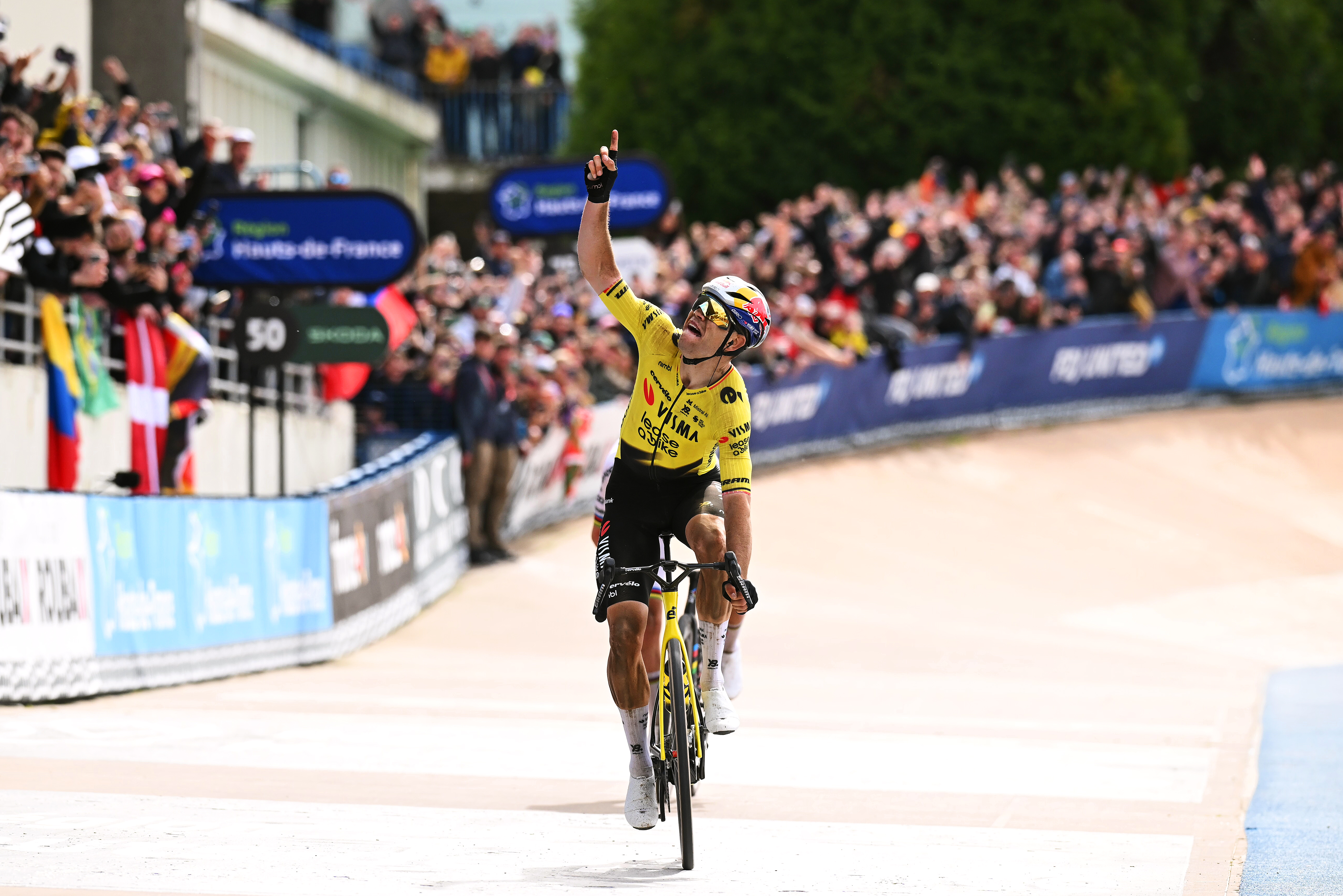 Wout van Aert celebrates at finish line as race winner in the 2026 Paris-Roubaix