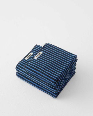 Tekla towels in dark blue and light blue striped pattern