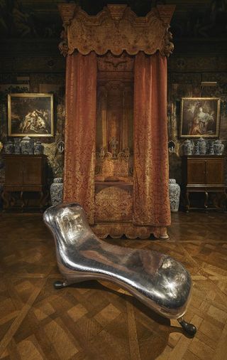 A prototype of Marc Newson’s Lockheed Lounge is displayed alongside a state bed dating back to 1810