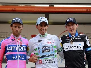 Michele Scarponi doesn't seem too fussed although Alberto Contador is a happy winner.