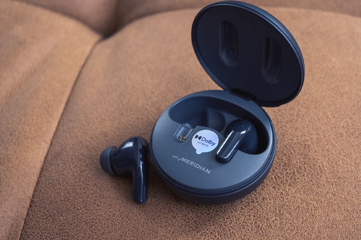 LG Tone Free T90Q on a couch