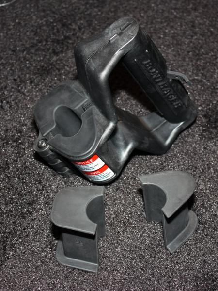 This clamshell adapter provides a safe mounting point for Trek Madone frames when using repair stands.