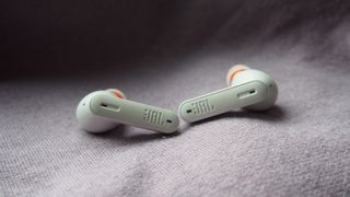 the jbl tune 230nc true wireless earbuds in white