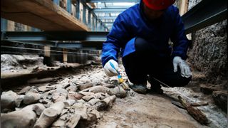Archaeologist works at the excavation site of the mausoleum of Emperor Wendi of the Han Dynasty.