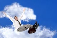 Business person on cloud