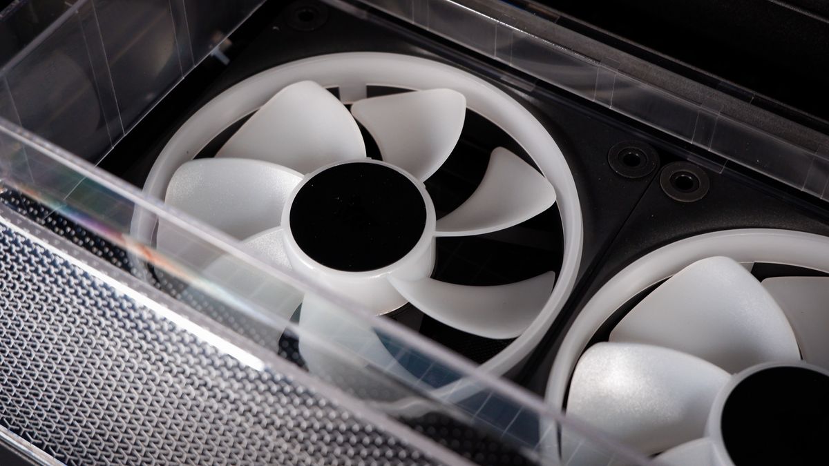 A Corsair Air 5400 PC case on a desk with various parts installed.