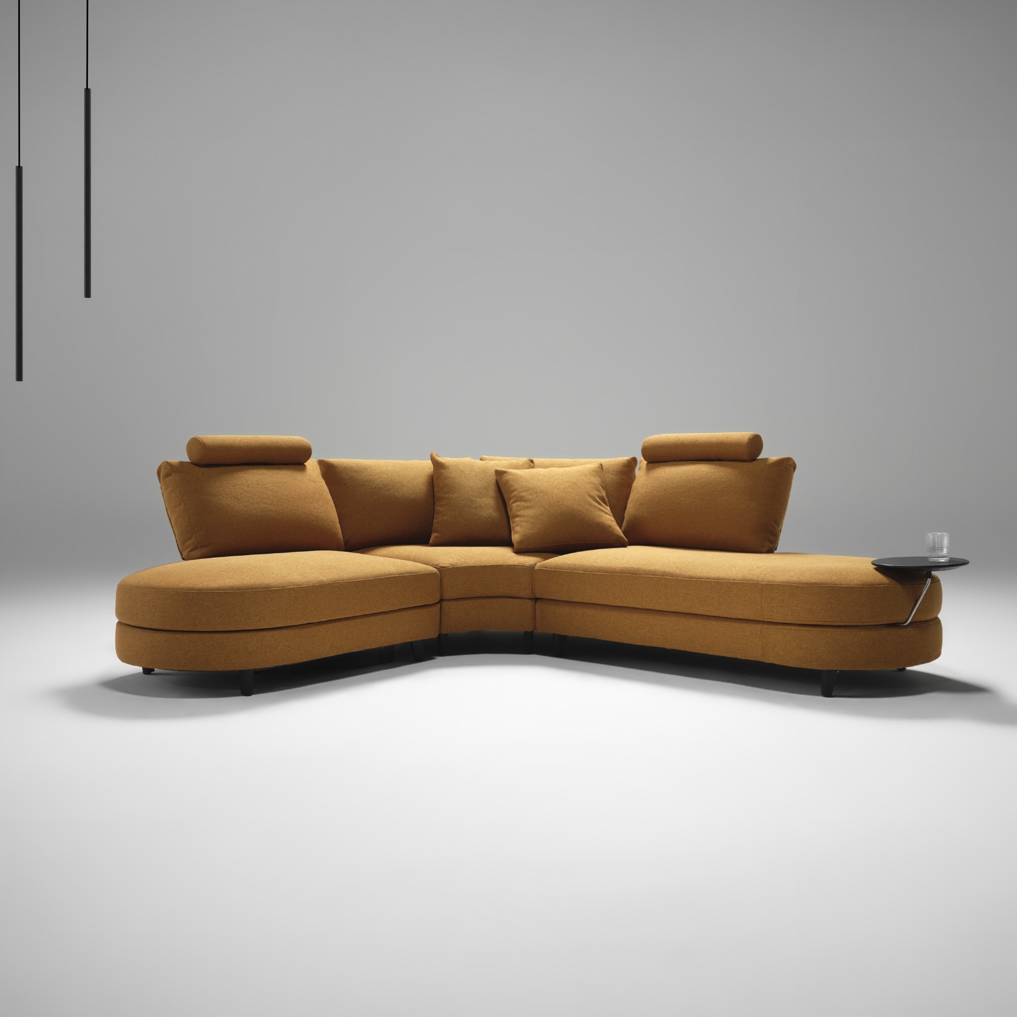King Living Delta 5 sofa in an orange shade in a studio setting