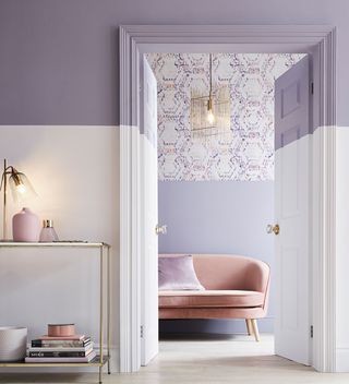 hallway with lilac and white painted walls and console table