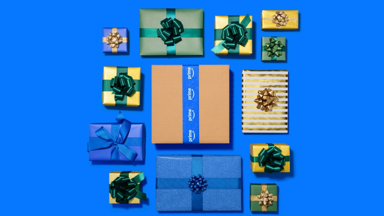 An Amazon Prime package surrounded by gift-wrapped packages of various sizes.