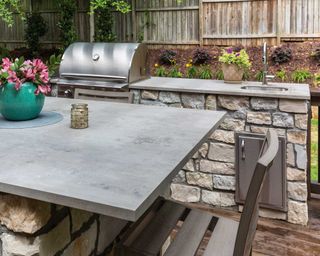 Outdoor kitchen with Neolith Beton Silk Outdoor Kitchen Table 12mm Designed by Stone Centre