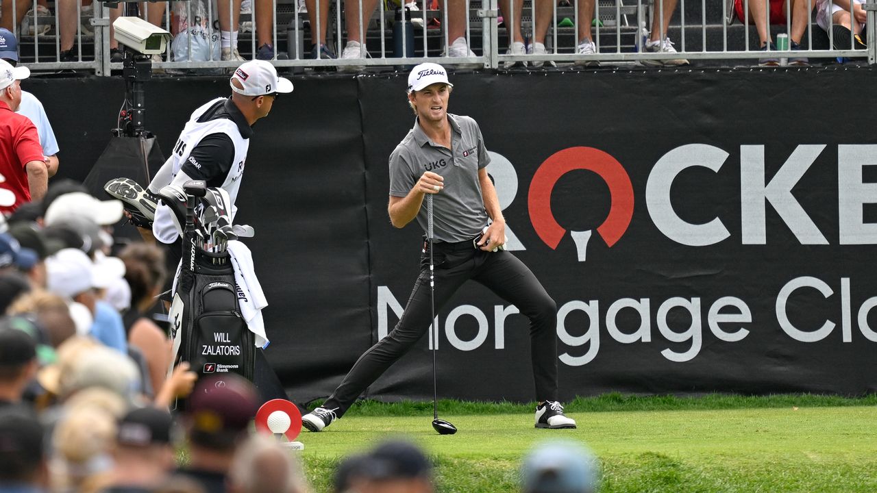 Will Zalatoris stretches before the first hole in round one of the 2024 Rocket Mortgage Classic