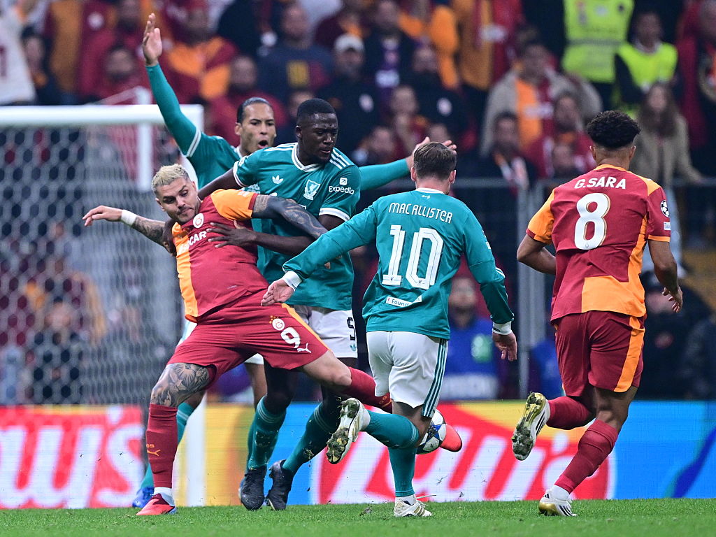 Mauro Icardi challenges Liverpool&#039;s Ibrahima Konate for the ball