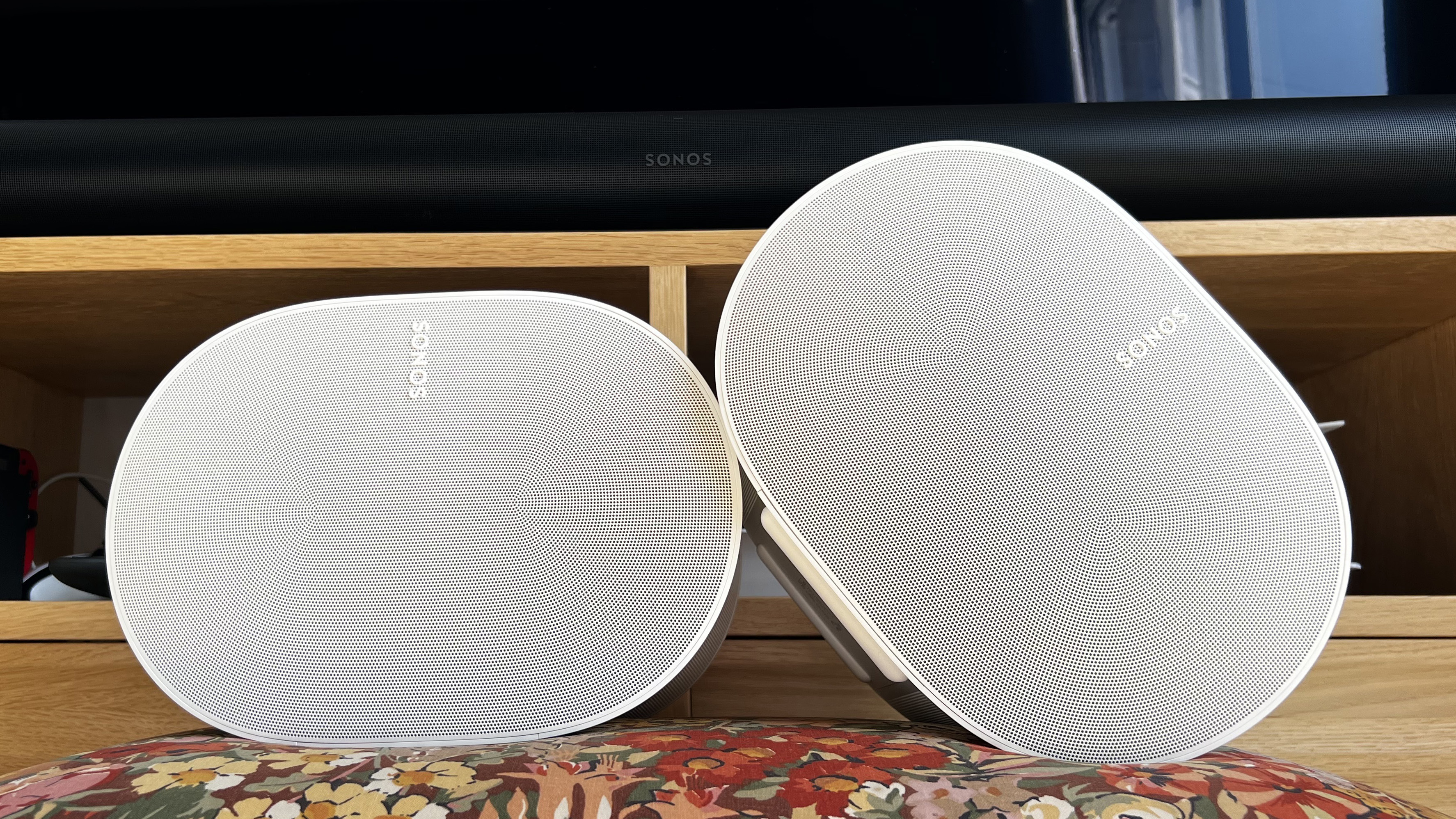 Sonos Era 300 pair in front of a Sonos Arc