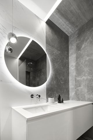A mirror with an illuminated circle of light