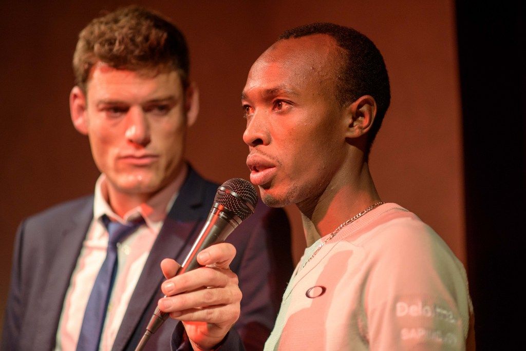 Adrien Niyonshuti is interviewed on stage by mc Ashley House