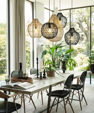 Oversized lighting above dining table