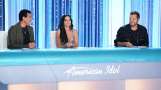 Lionel Richie, Katy Perry and Luke Bryan sitting on a panel for American Idol