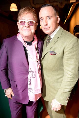 Elton John And David Furnish At The Saville Row Show