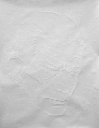 White imprint of a man's face