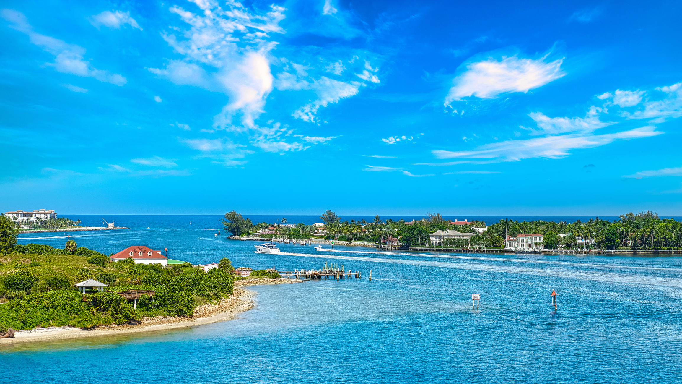 Port of Palm Beach, Florida. It&#039;s a sunny day and the water is a bright blue.