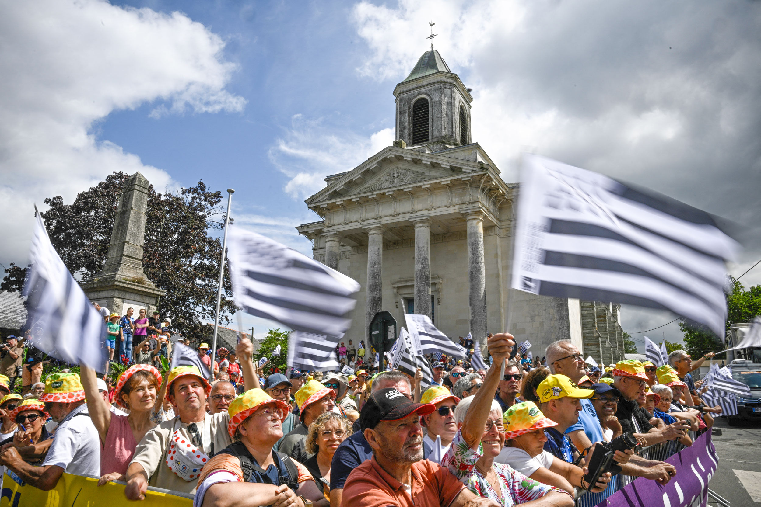 A shot of Breton fans waving dozens of Breton flags ahead of stage 3 of the Tour de France Femmes in La Gacilly