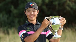 Kris Kim with the trophy after winning the &A Boys' Amateur Championship