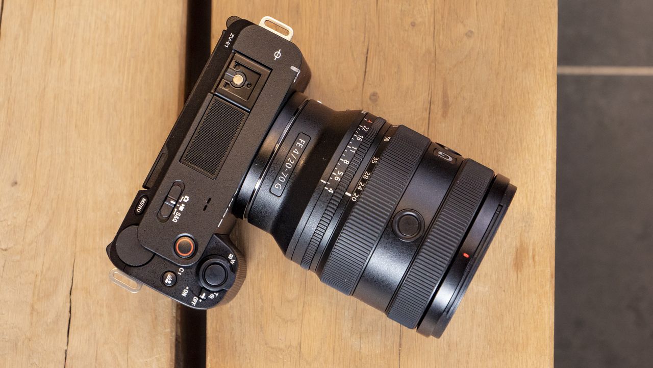 The Sony ZV-E1 camera sitting on a wooden table