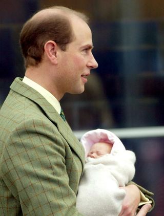 Prince Edward with baby daughter Louise Windsor