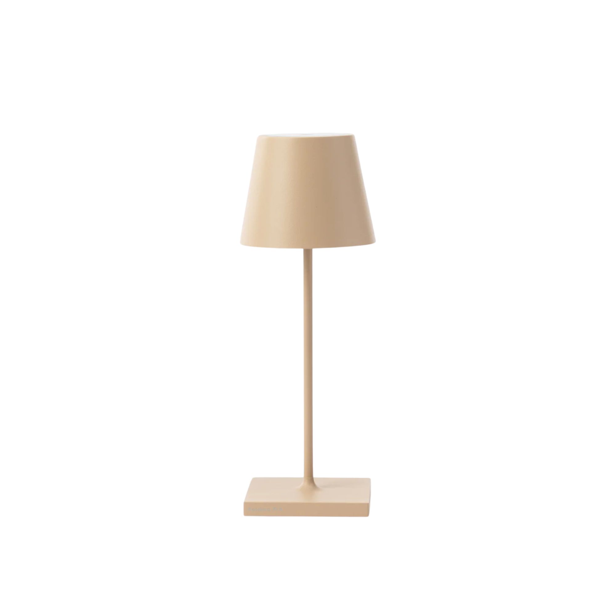 A sandy colored table lamp with a drum shaped shade
