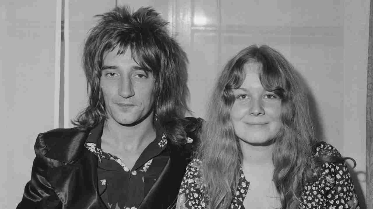 Sandy Denny posing for a photograph with Rod Stewart