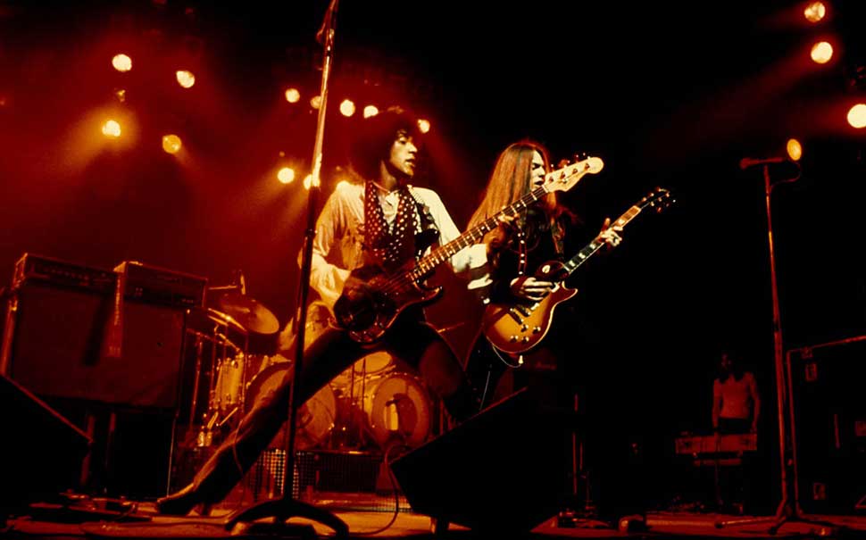 Phil Lynott and Scott Gorham onstage