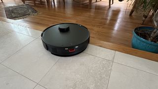 Yeedi C12 Pro Plus robot vacuum stopping adjacent to a measurement down